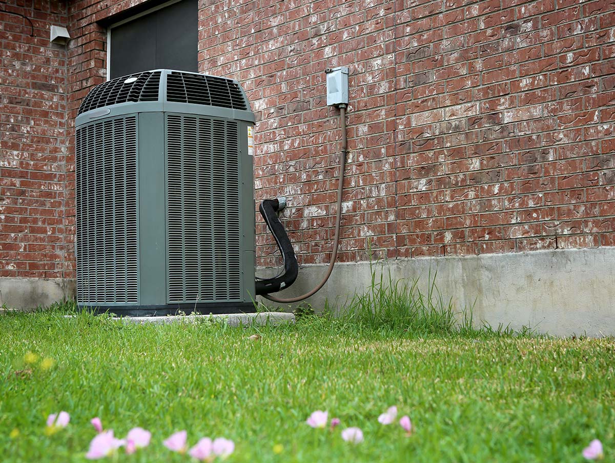 New air condensers installed outside a home - Air Conditioning Repair and Installation In Bardstown, KY | Above All Mechanical